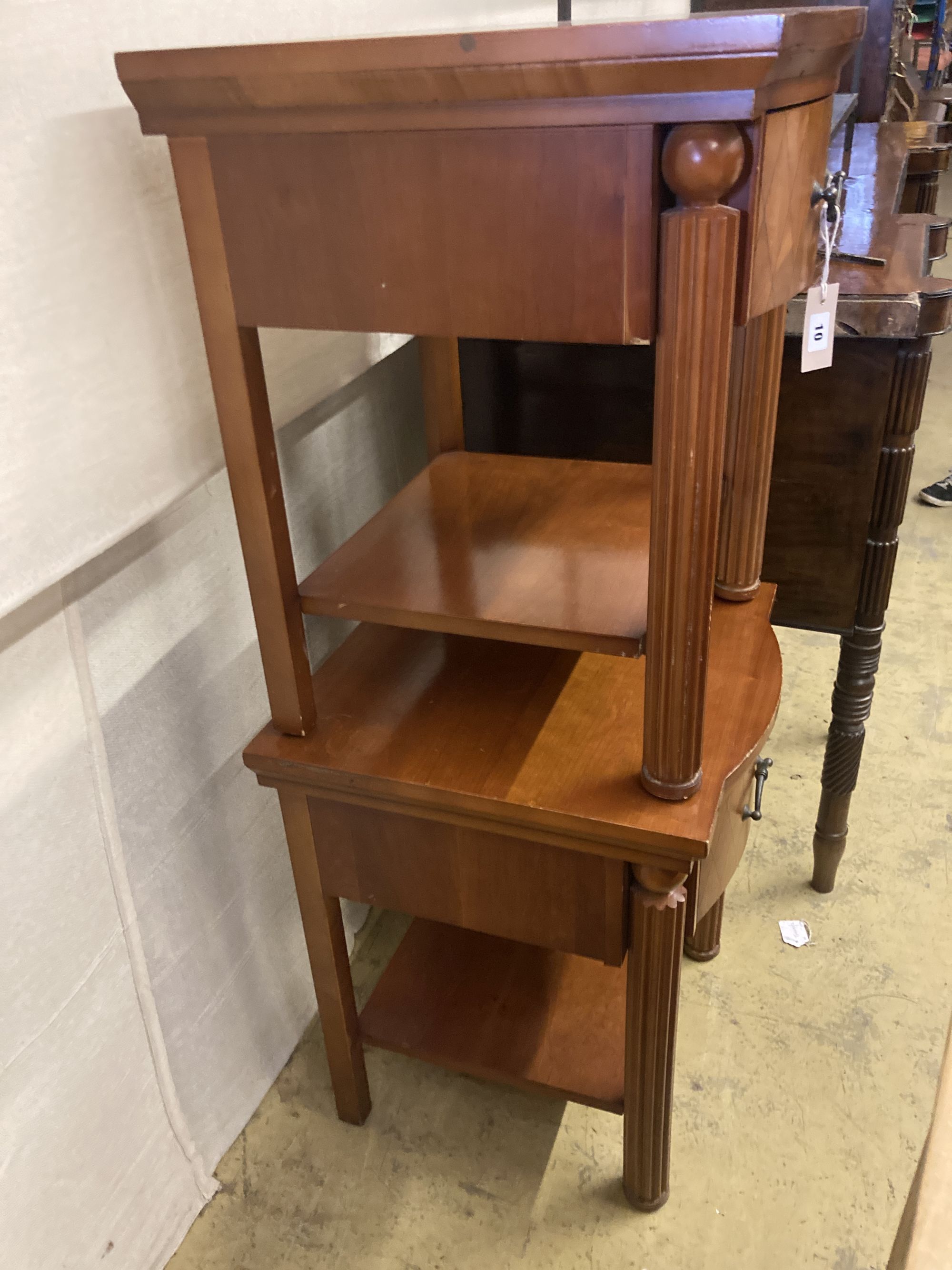 A pair of mahogany bow front bedside tables, width 50cm, depth 50cm, height 62cm